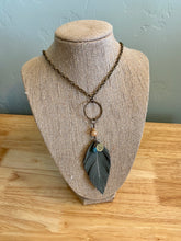 Load image into Gallery viewer, Gray Leather Feather 30" Necklace with stamped Idaho charm and bead.