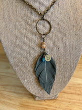 Load image into Gallery viewer, Gray Leather Feather 30" Necklace with stamped Idaho charm and bead.